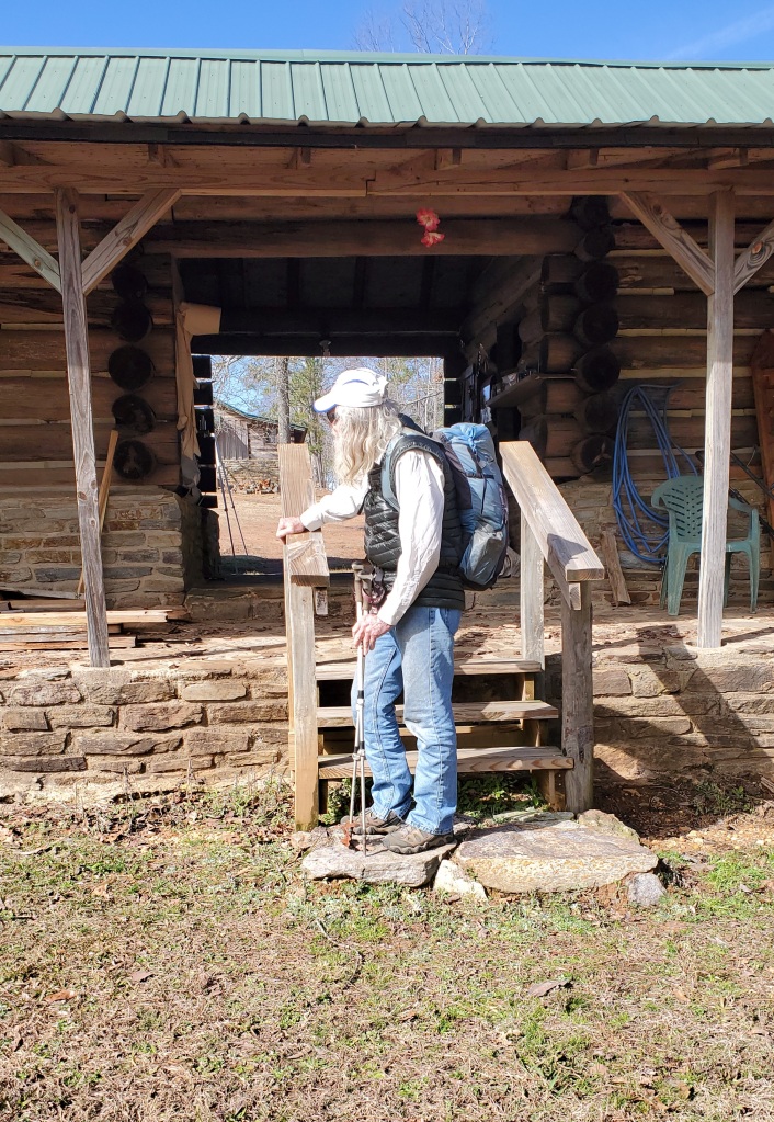 Nimblewill Nomad at the steps of his cabin on Flagg Mt